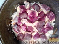 Фото приготовления рецепта: Утка, тушенная с квашеной капустой - шаг №5
