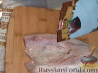 Фото приготовления рецепта: Скумбрия фаршированная, варенная в пакете - шаг №11