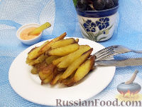 Фото к рецепту: Жареный картофель с чесночным соусом