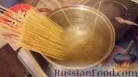 Фото приготовления рецепта: Спагетти с морепродуктами в сливочном соусе - шаг №11