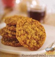 Фото к рецепту: Овсяное печенье с кокосовой стружкой